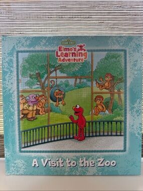 Elmo's Learning Adventure: A Visit to the Zoo - Teal Cover